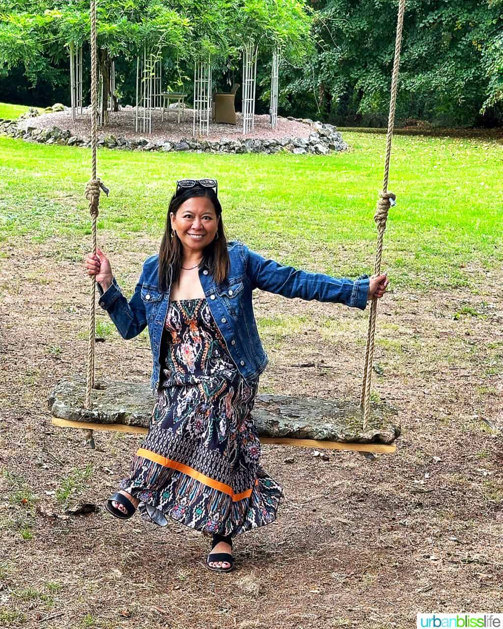 Marlynn Jayme Schotland on a swing at Chateau de Valcreuse in La Roche-Posay, France.
