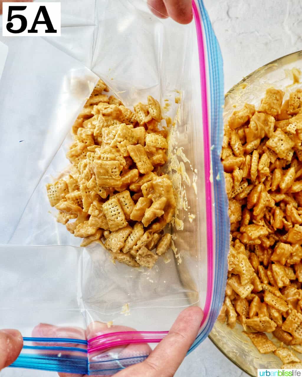 transferring patriotic puppy chow into a plastic bag.