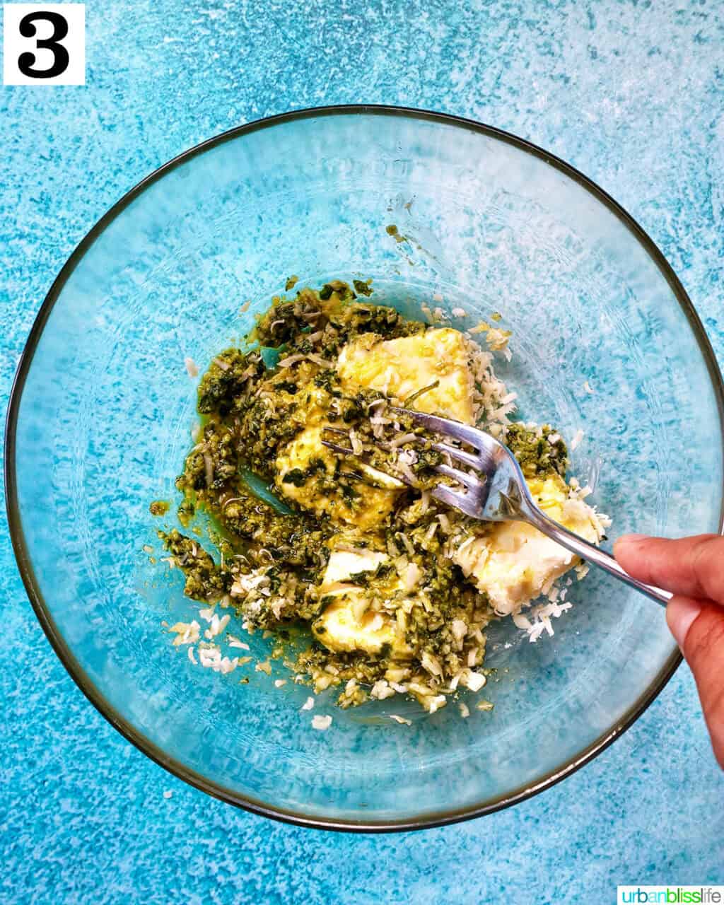 making pesto spread in a large bowl.