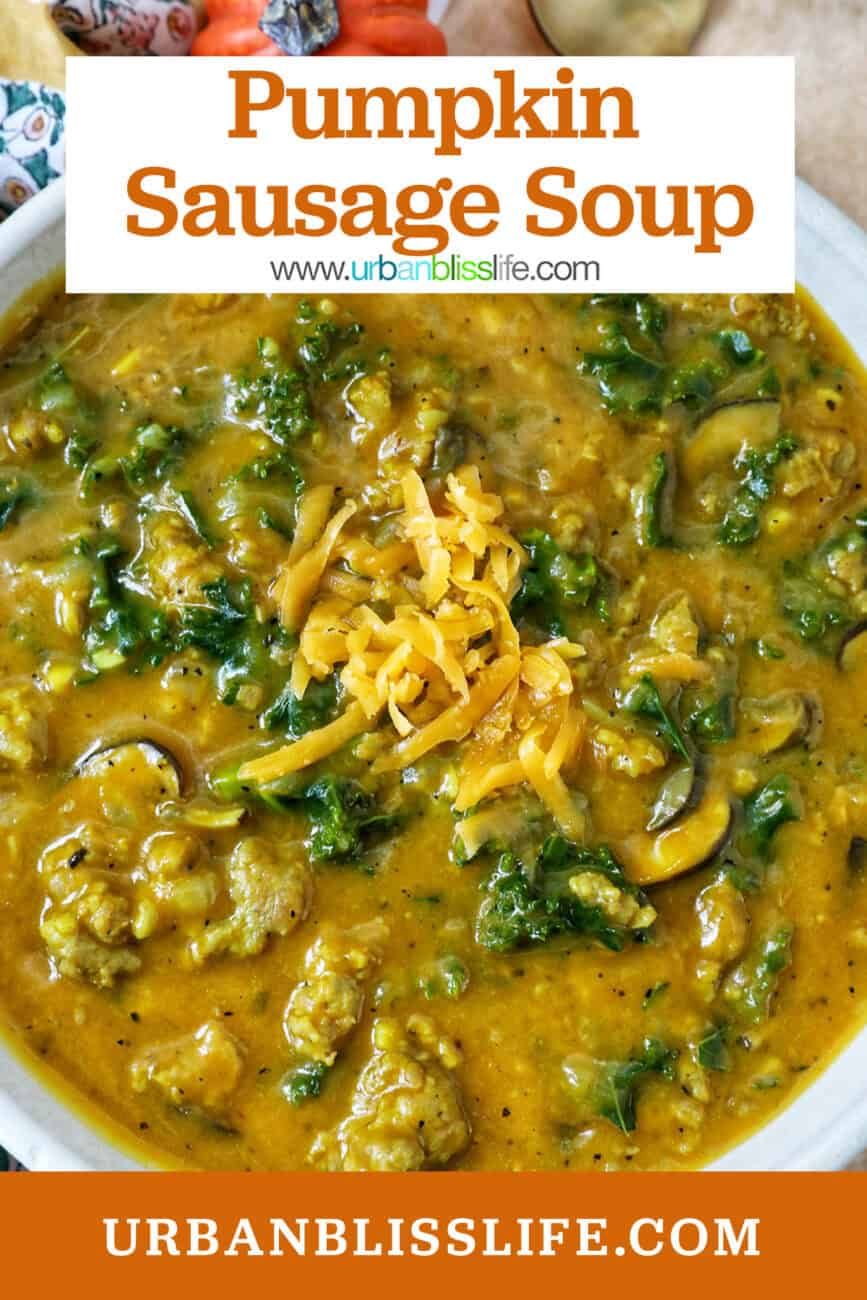bowl of pumpkin soup with sausage, greens and cheese with title text overlay.