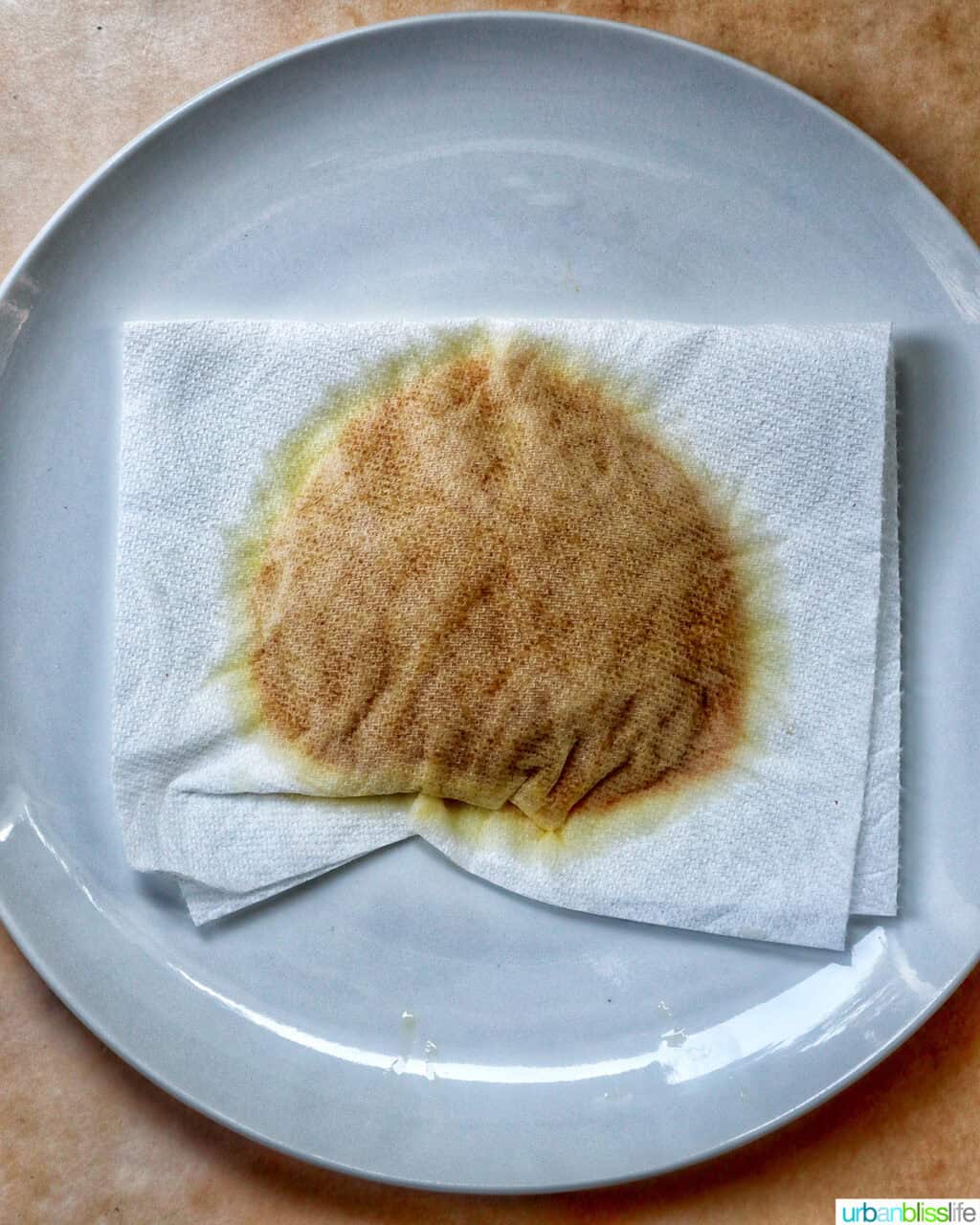 paper towel blotting pumpkin puree