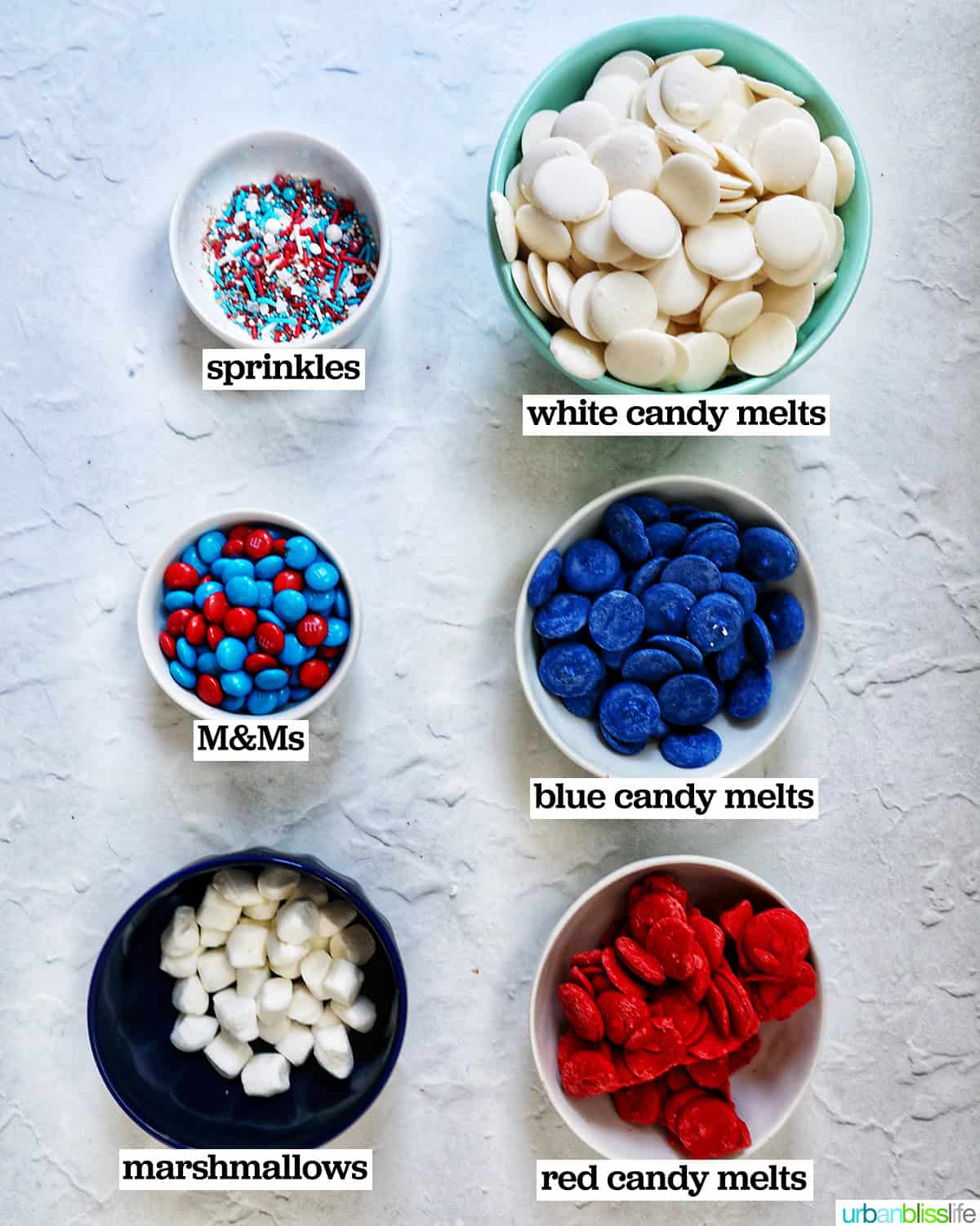 bowls of ingredients to make red, white, and blue bark.