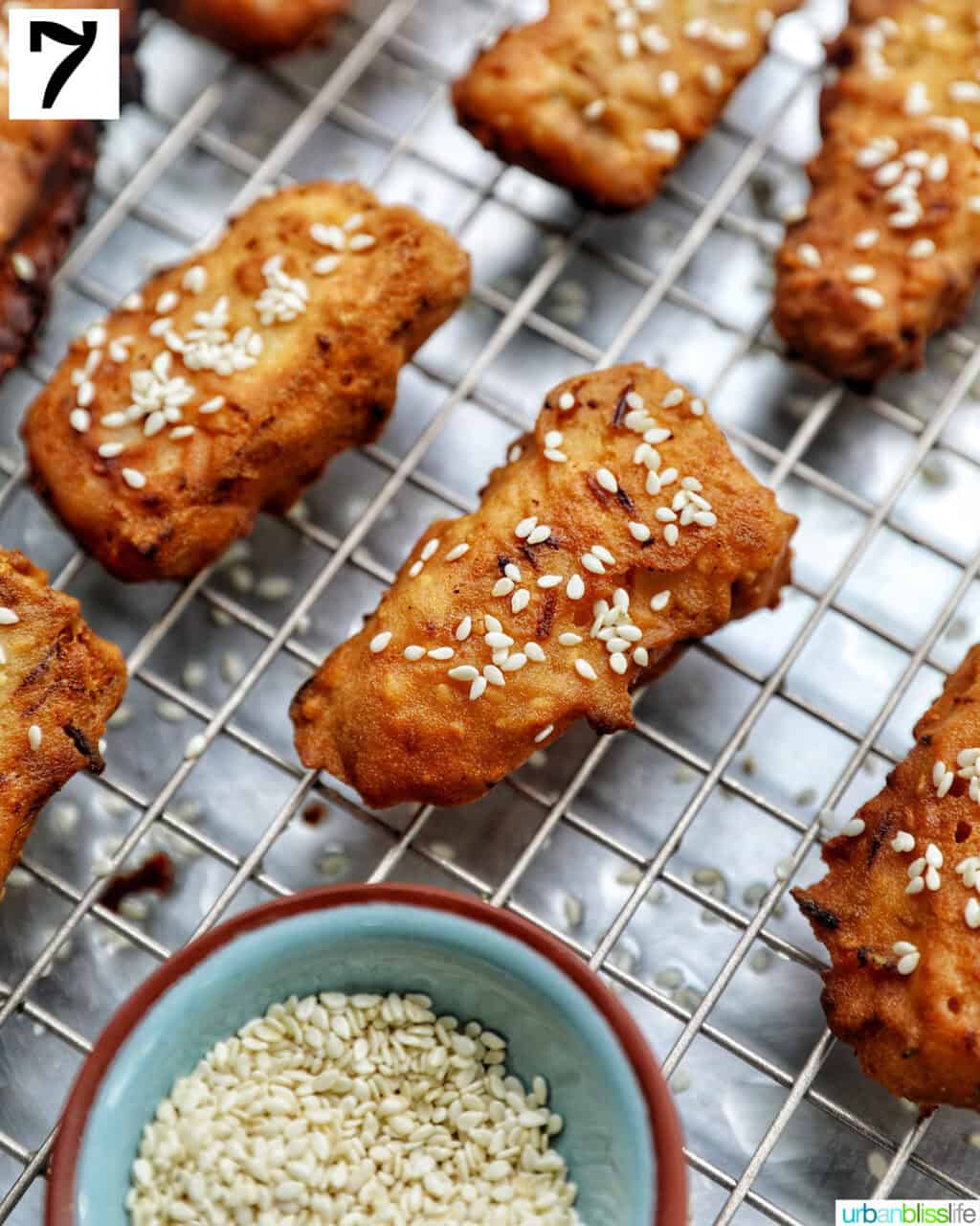 Thai fried bananas on a cooling rack.