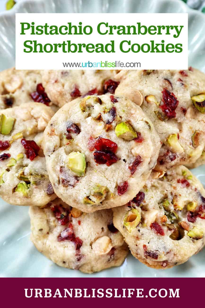 pistachio cranberry shortbread cookies piled onto a plate with title text overlay.