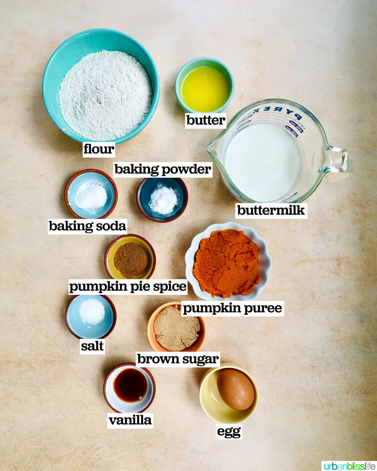 bowls of ingredients to make pumpkin pie spice pancakes.