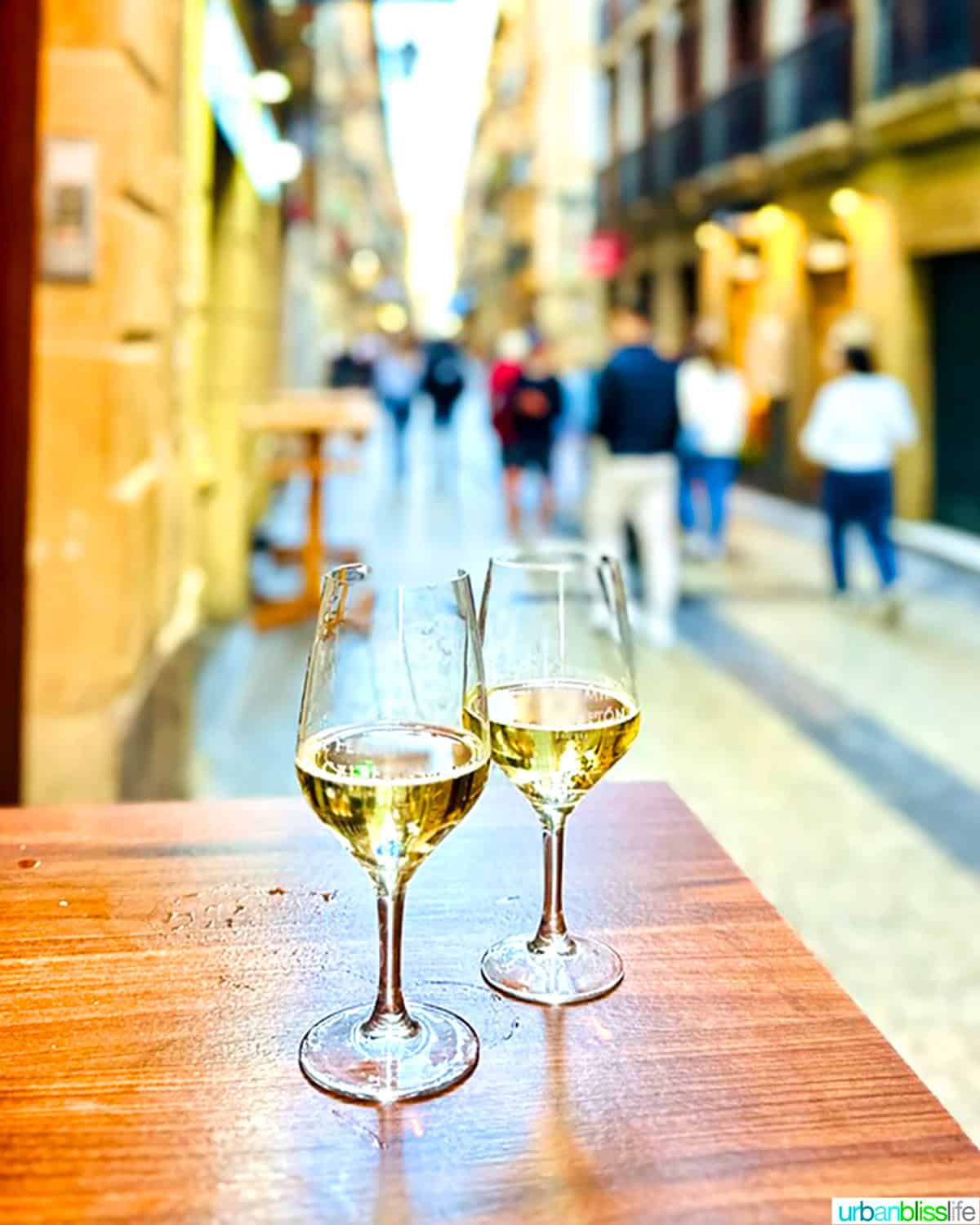 txakoli wine in two glasses