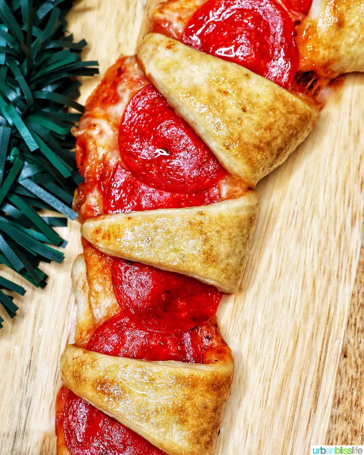 closeup of part of a candy cane pizza.