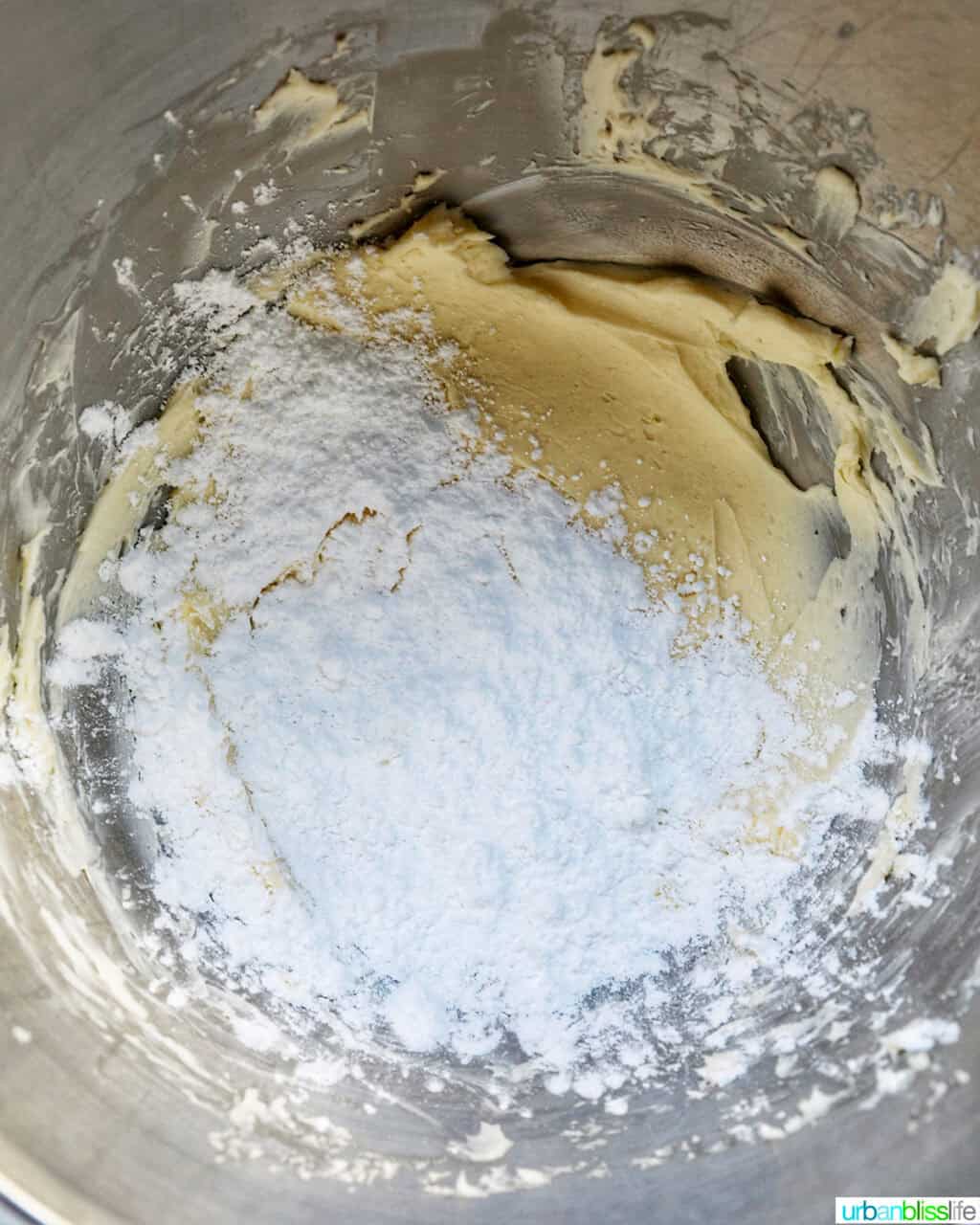 powdered sugar and butter in a stand mixer bowl.