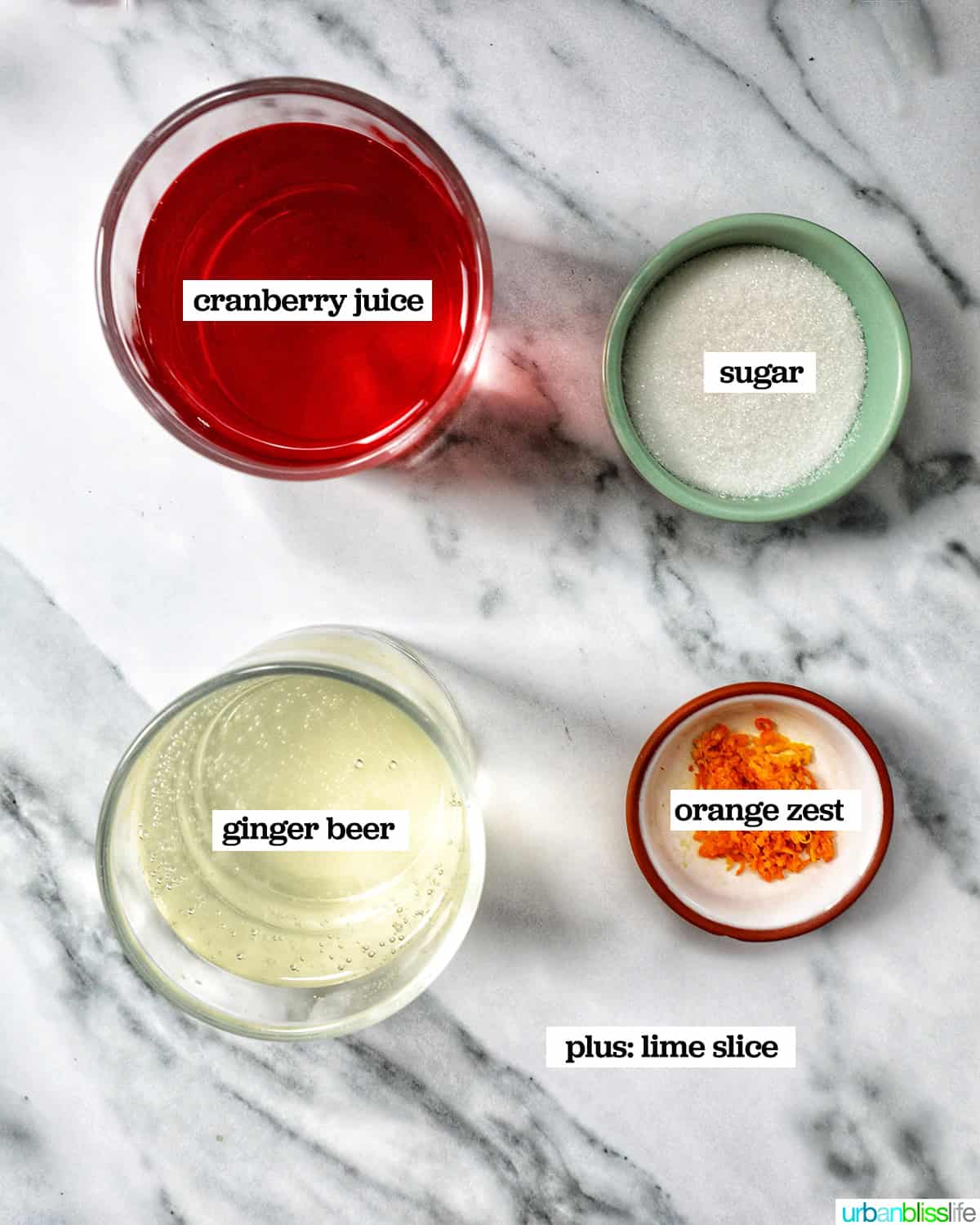 bowls of ingredients to make cranberry mocktails.