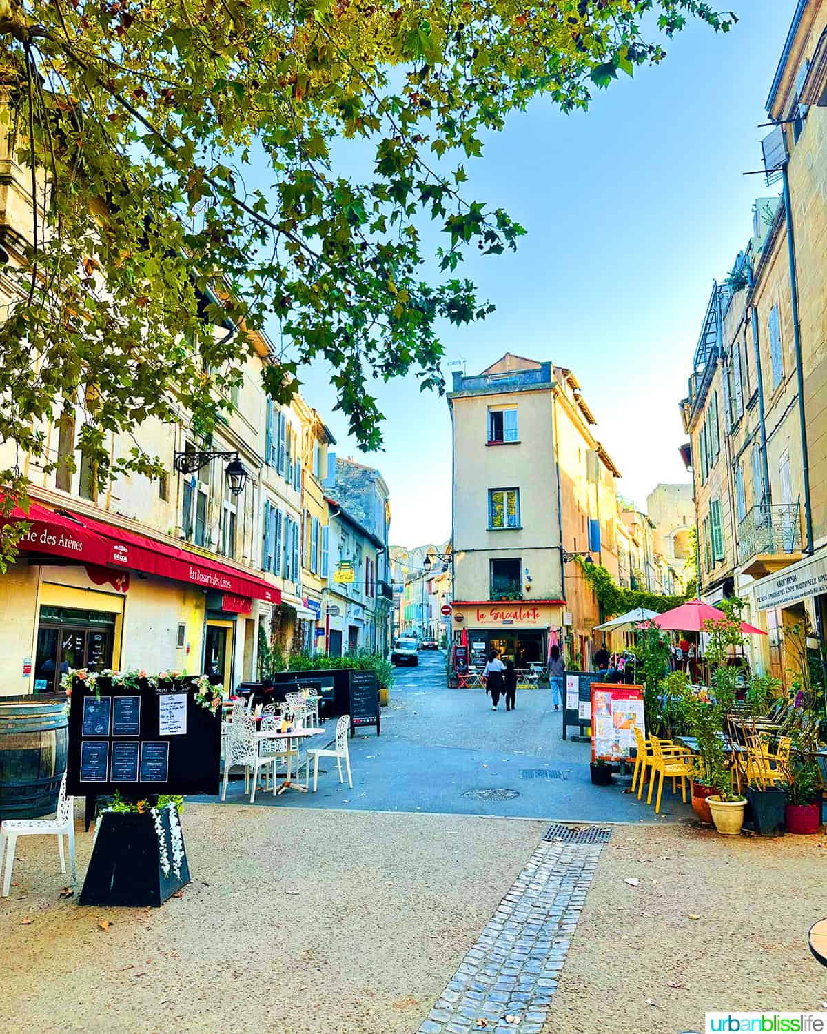 quaint colorful square in arles, france