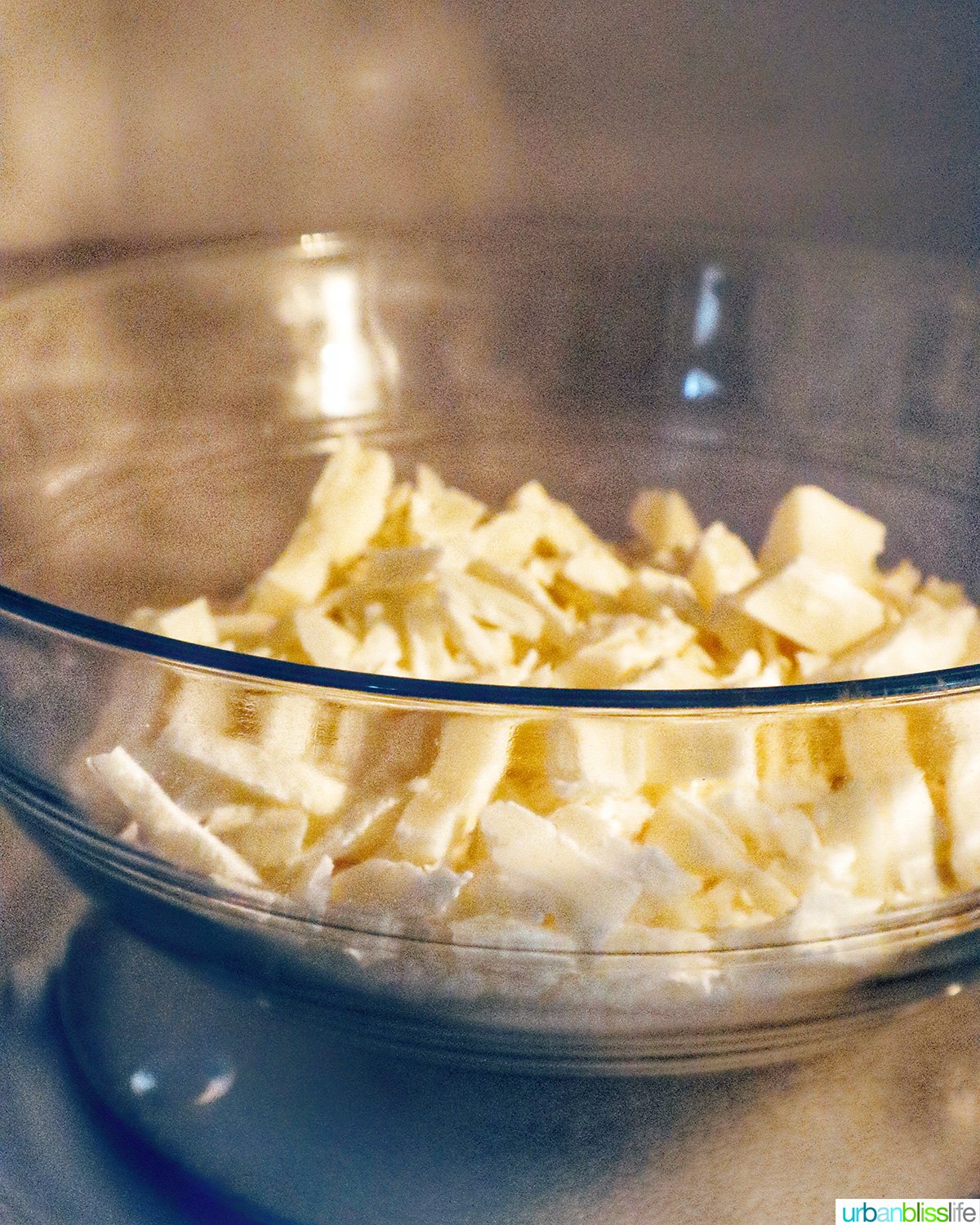 white chocolate almond bark in a bowl in the microwave.