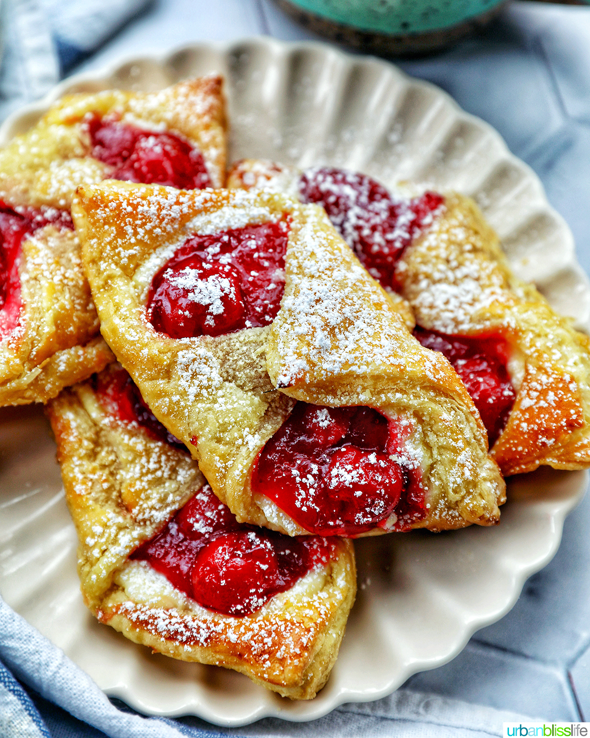 cherry danish pastries on a plate