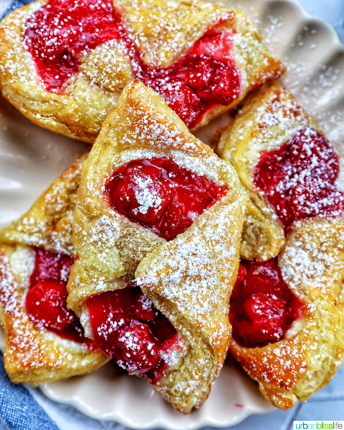 cherry danish pastries on a plate