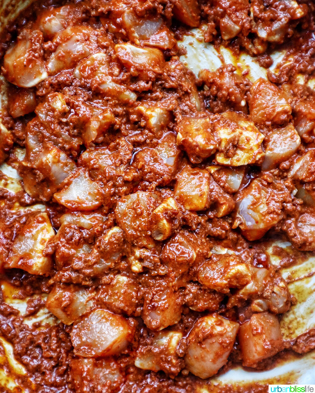 chicken and chorizo in a pan.