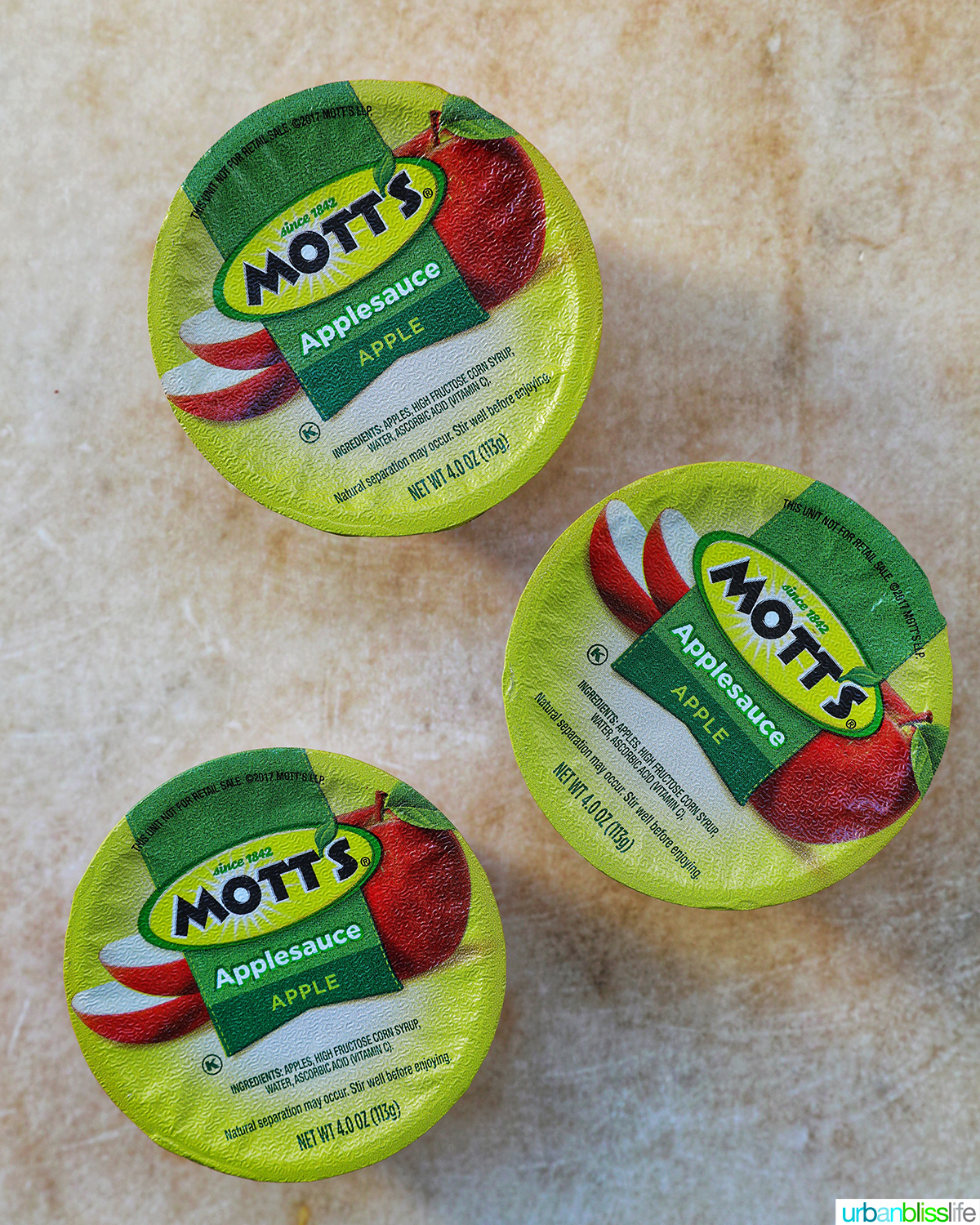 three applesauce cups.
