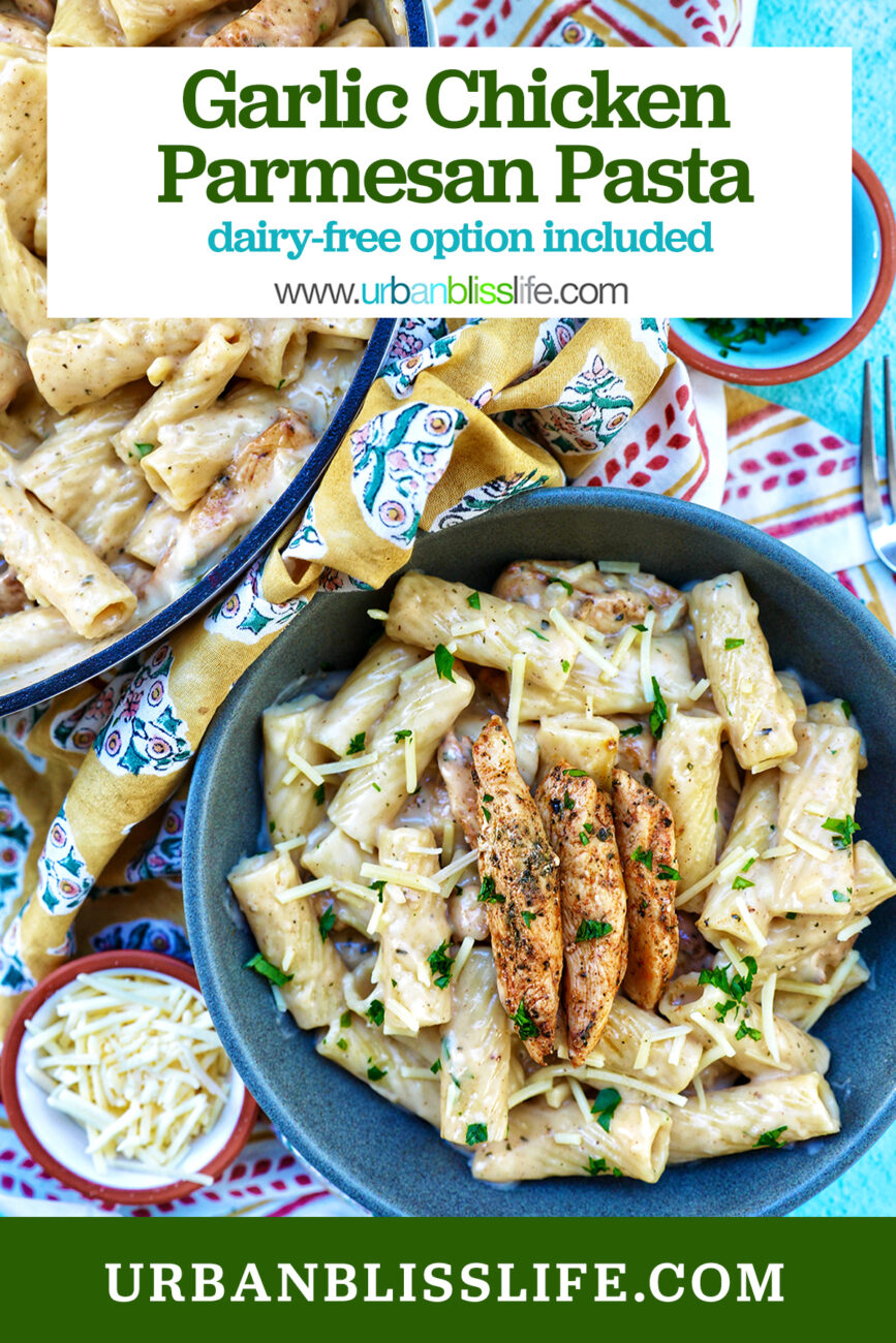 Bowl of garlic chicken parmesan pasta with side bowl of parsley next to pan of pasta and title text overlay.