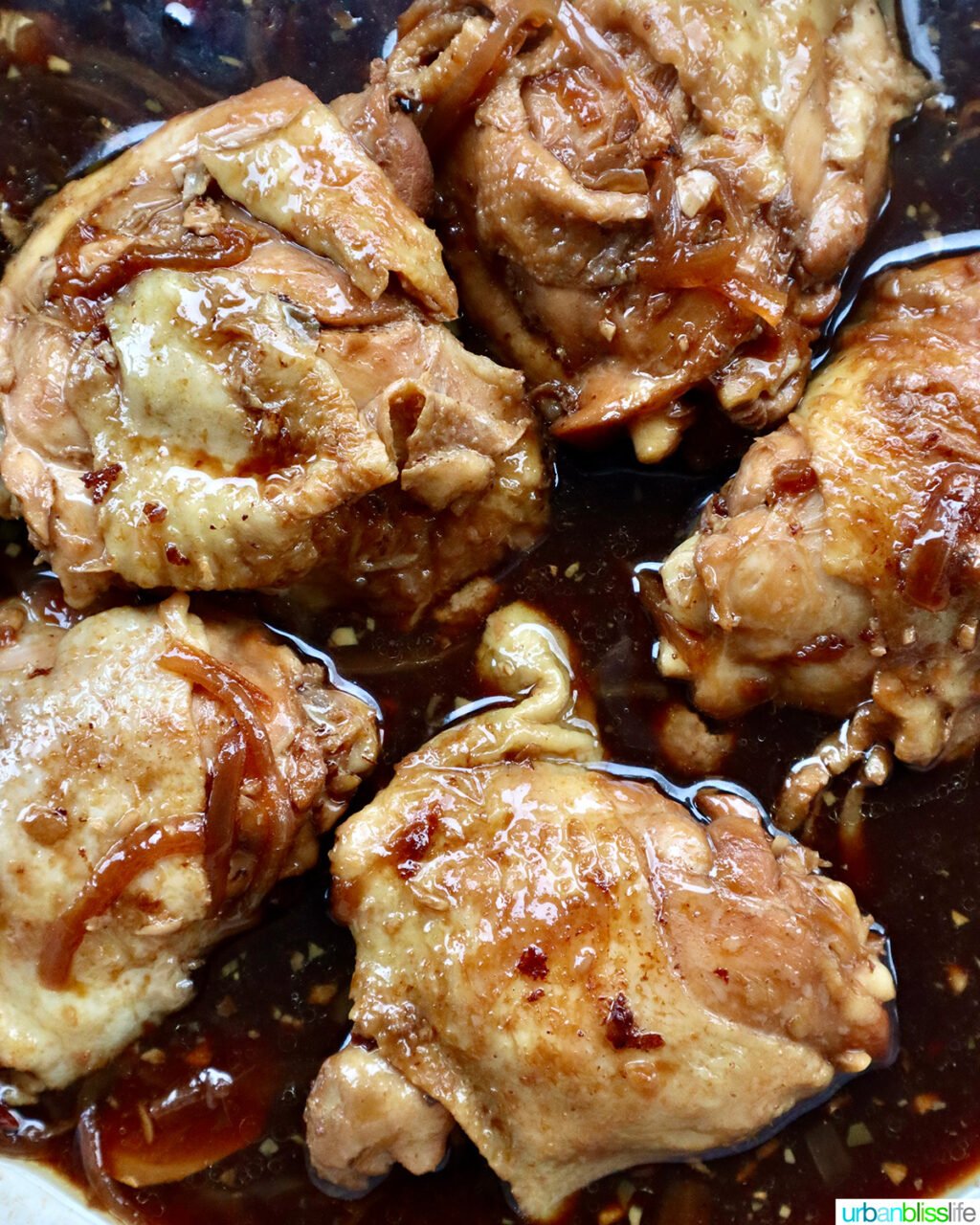Chinese braised chicken thighs in a skillet.