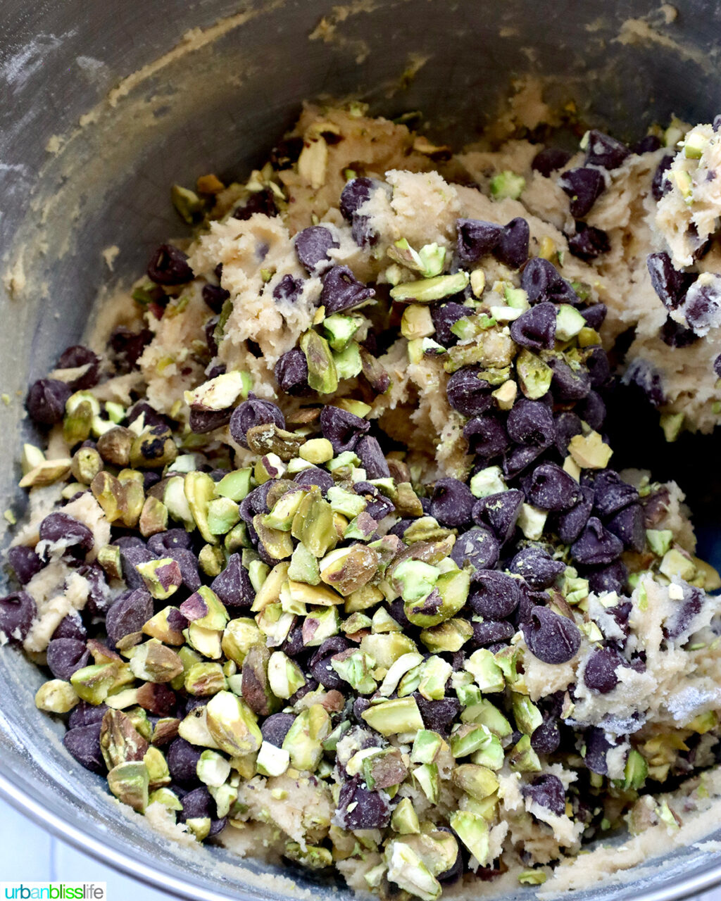 chopped pistachios and chocolate chips added to cookie batter.