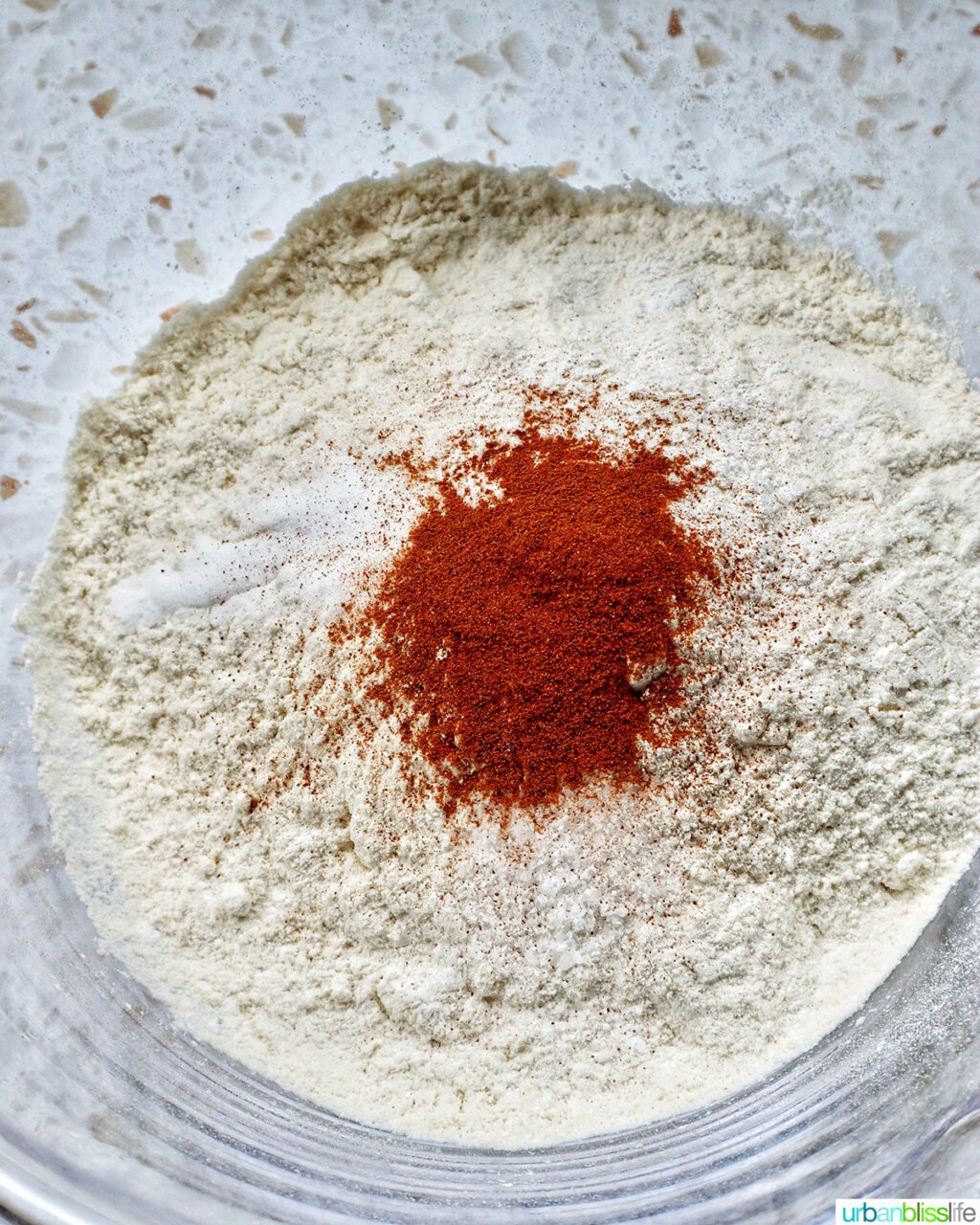 dry ingredients in a bowl for churro donuts.