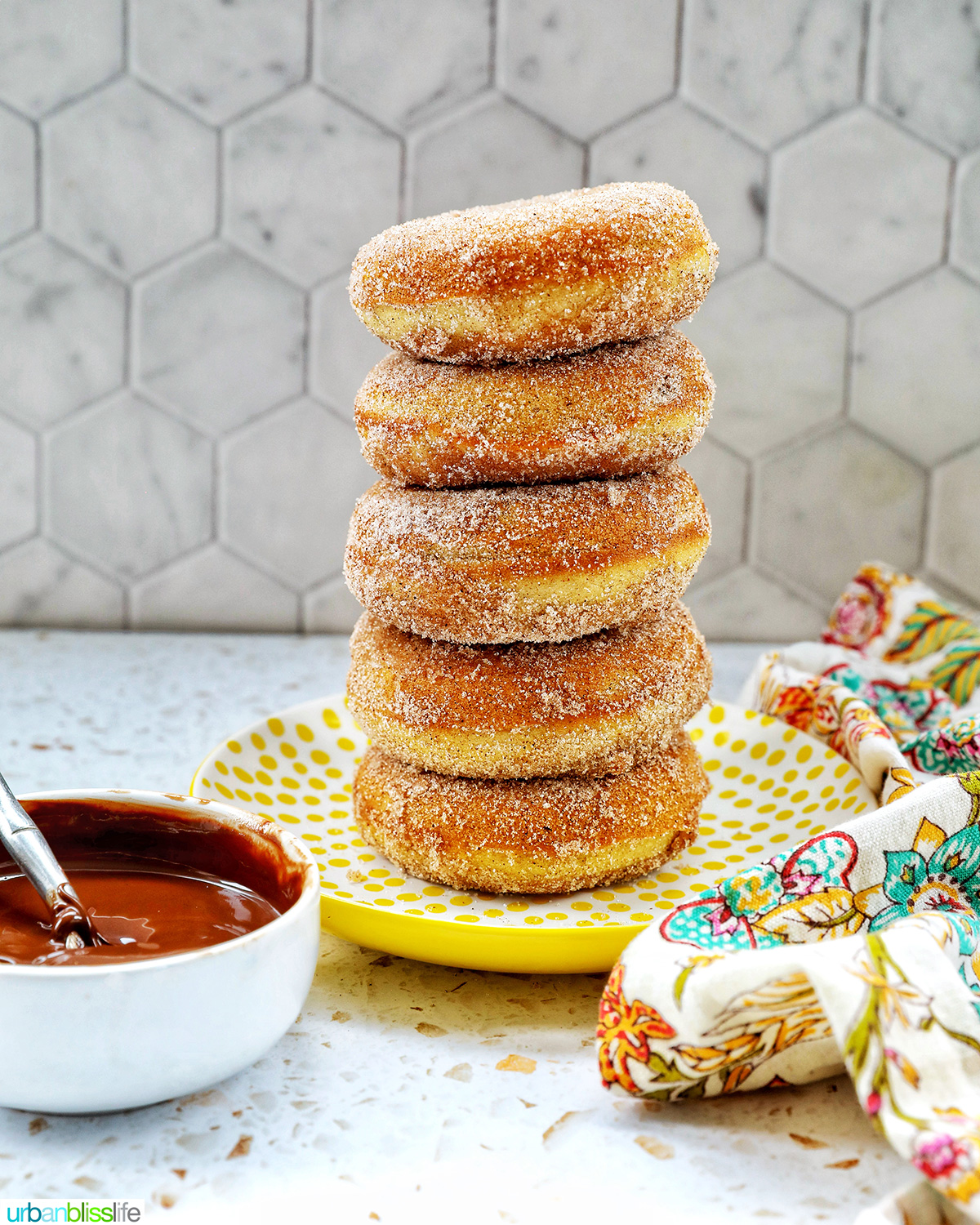 stack of churro donuts.