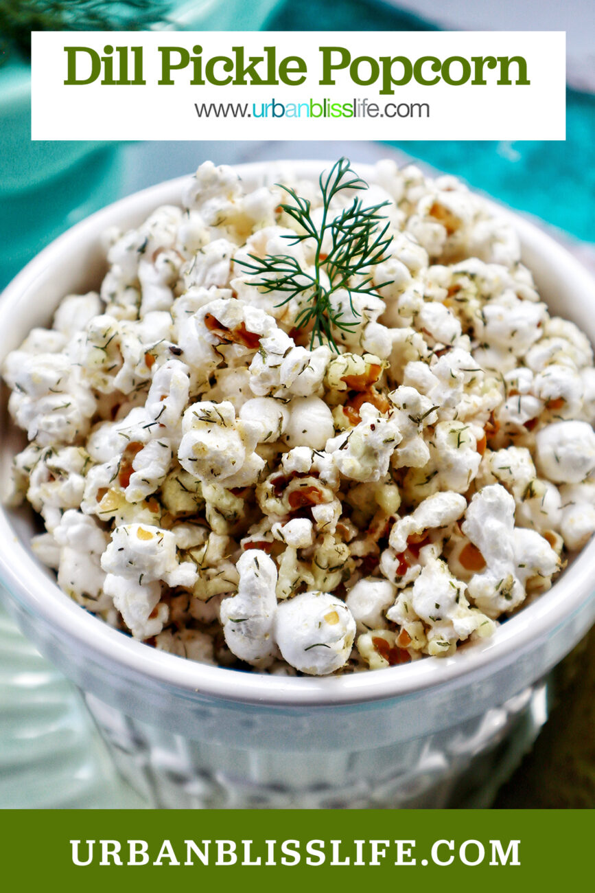 dill pickle popcorn in a white bowl with title text overlay.
