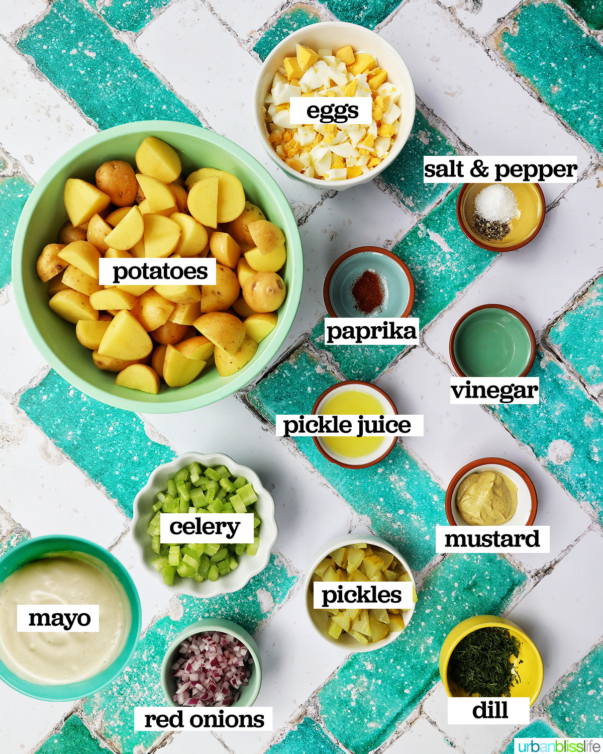 bowls of ingredients to make dill pickle potato salad.
