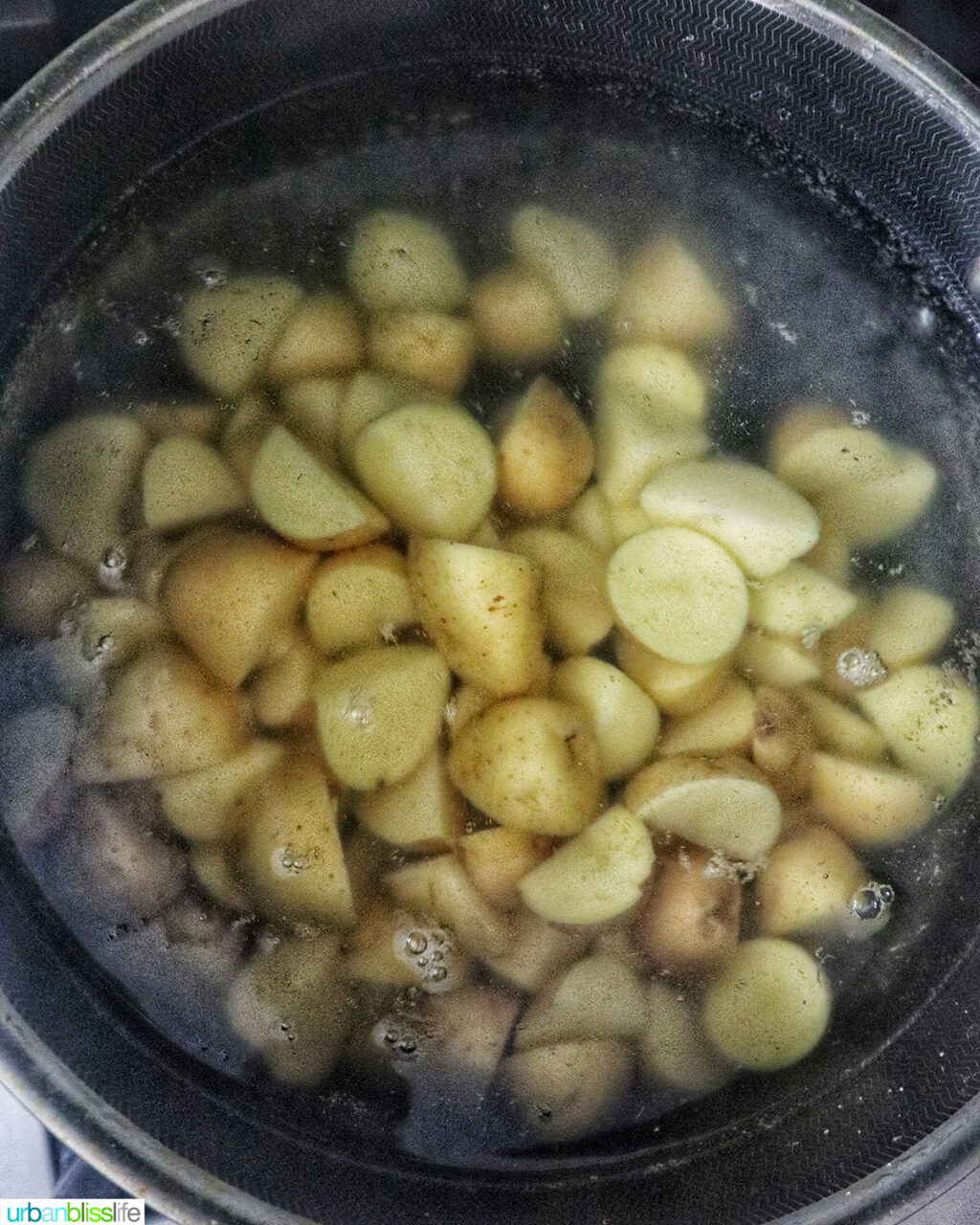 yukon gold potatoes boiling in water.