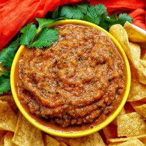 mango habanero salsa in a bowl with tortilla chips.