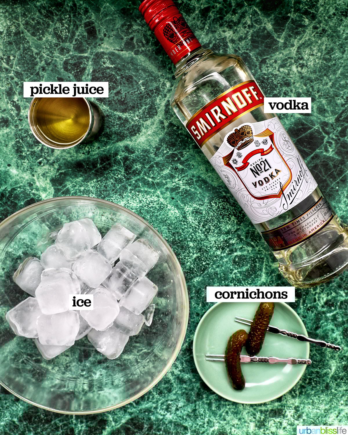 ingredients to make a dill pickle martini.
