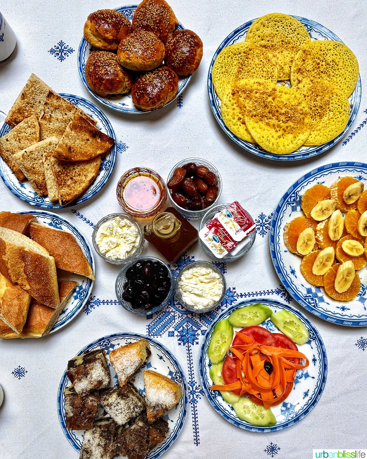 breakfast table full of fresh Moroccan food at Riad Salam Fes in Fes, Morocco.