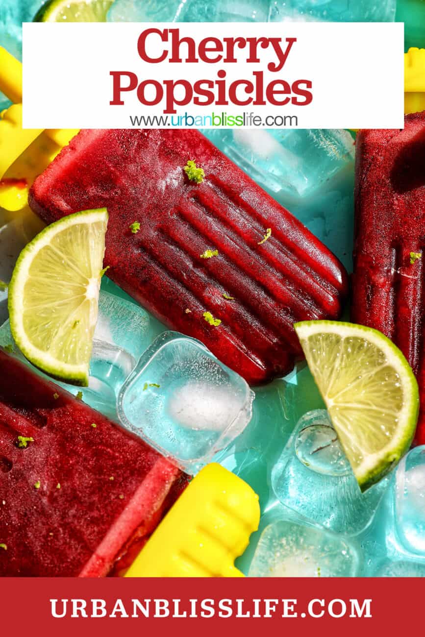 cherry popsicles on ice with slices of lime with title text overlay.