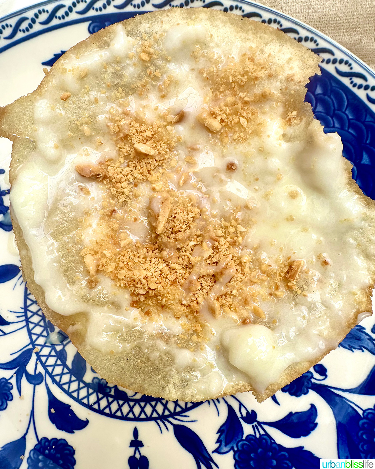 milk bastilla on a blue and white plate.