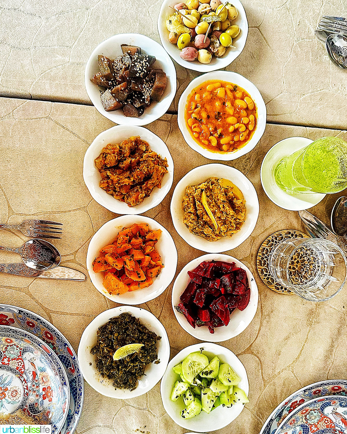 several colorful dishes with Moroccan food.