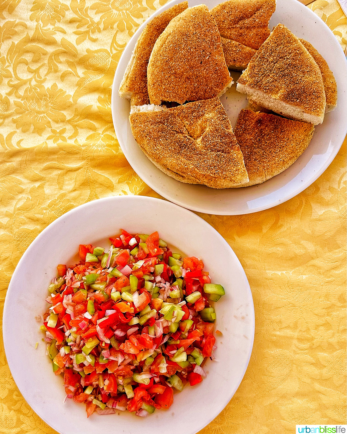 Moroccan khobz bread and tomato cucumber salad.