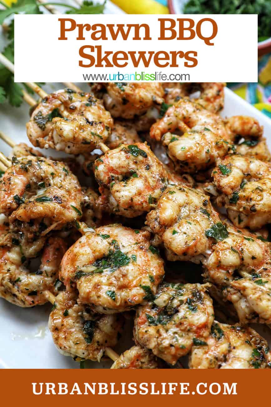 prawn BBQ skewers stacked on a plate with title text overlay.