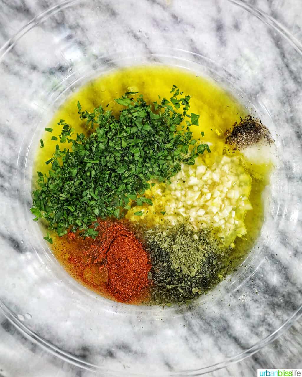 bowl of marinade ingredients for shrimp.