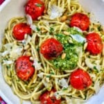 cherry tomato and pesto pasta in a bowl.