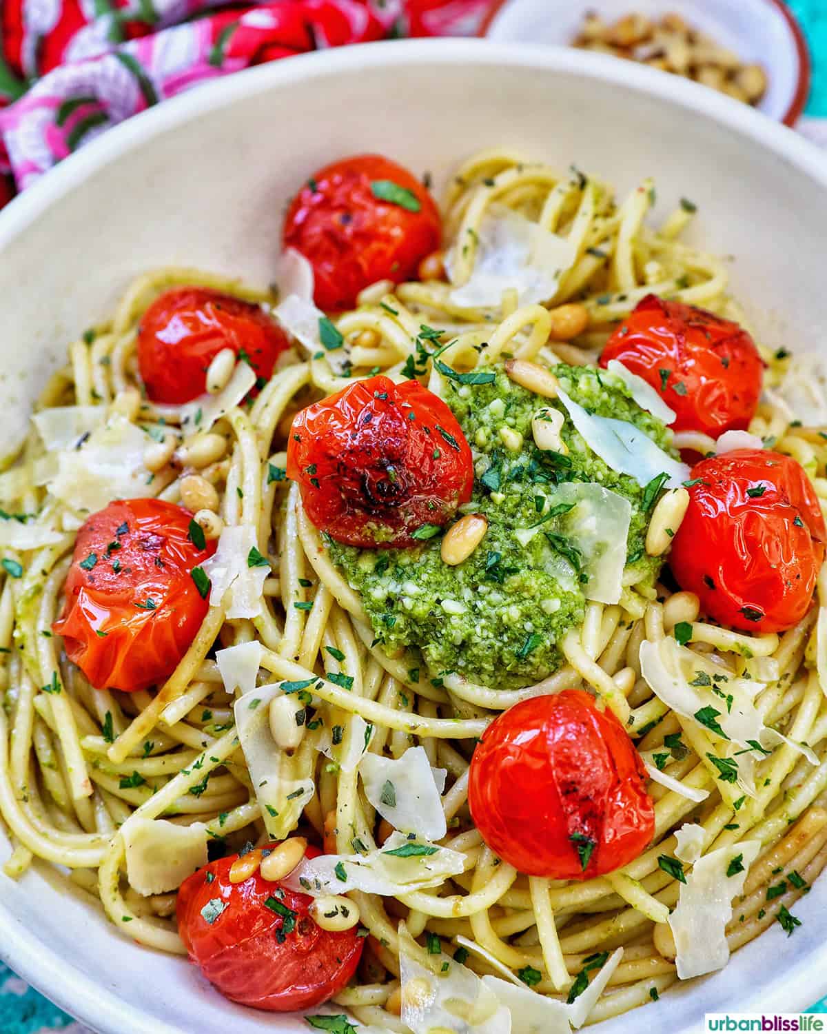 bowl of cherry tomato and pesto pasta.