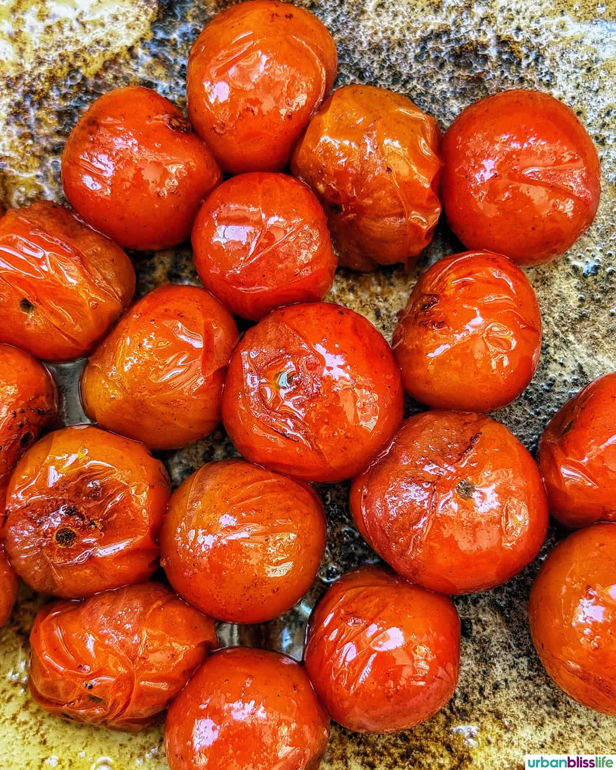 cherry tomatoes in a skillet.