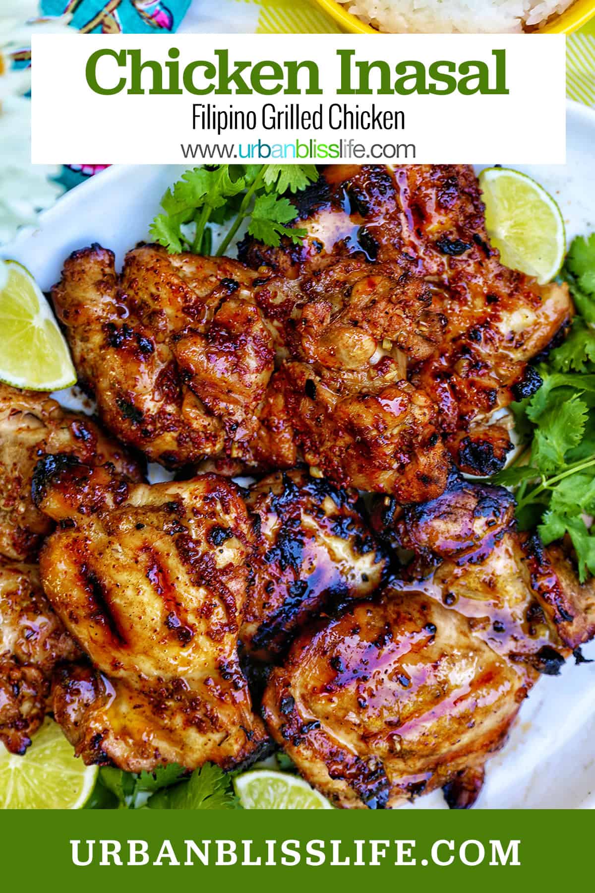 Filipino grilled chicken inasal on a platter with lime wedges and cilantro.