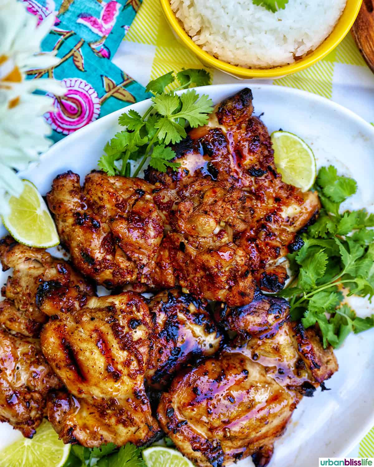 Filipino chicken inasal and bowl of white rice.