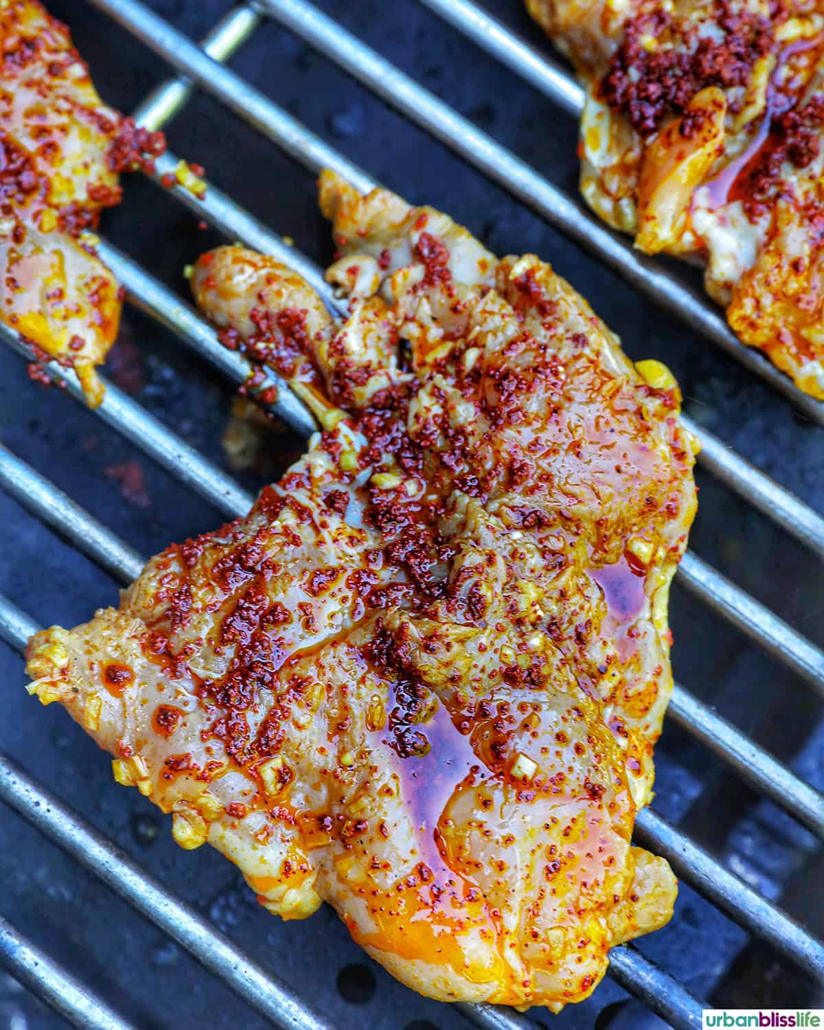 marinated chicken inasal on a grill.