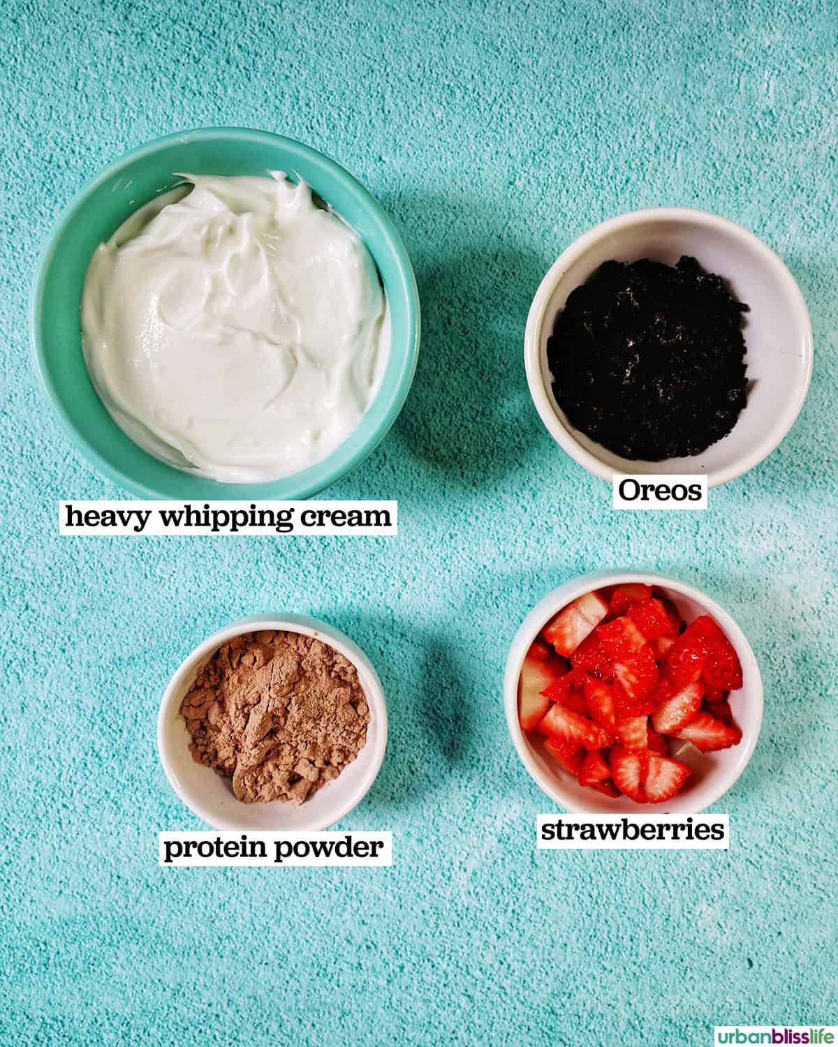 bowls of ingredients to make a high protein chocolate parfait.