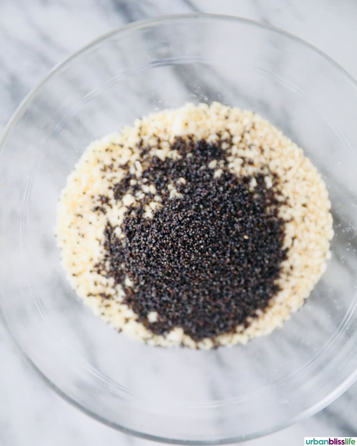 black sesame seeds and white sesame seeds in a bowl